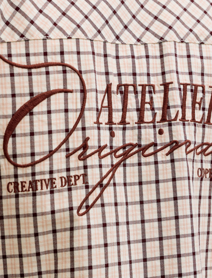 Chemise à carreaux à broderie pour homme
