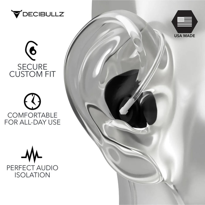Black Decibullz custom moldable earpiece with clear acoustic tube adapter worn in a mannequin ear for audio isolation.