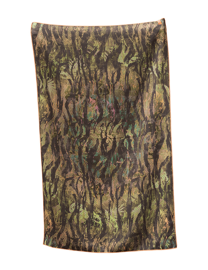 Waihana HydroTech Tropicam Towel laid flat, showing a dark green and brown camouflage print with an orange border trim.