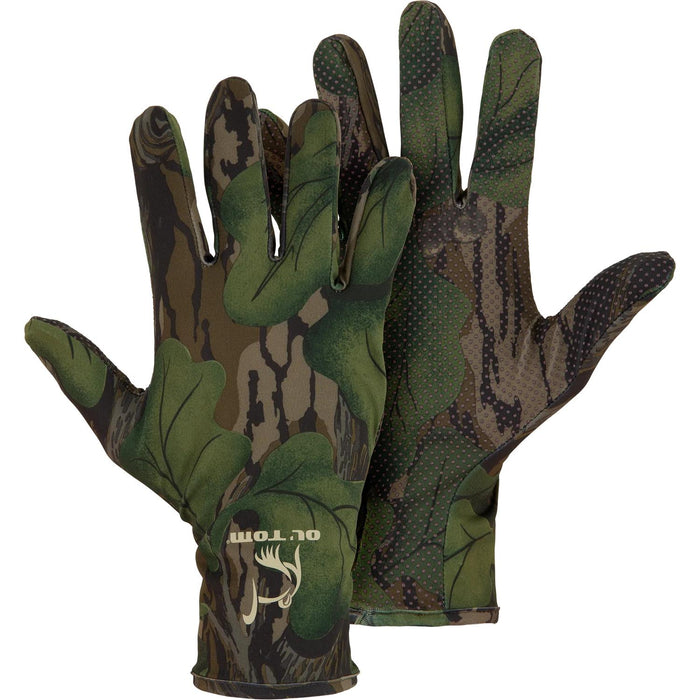 Ol' Tom camouflage turkey hunting gloves with a textured silicone grip palm and flexible stretch-fit polyester fabric.