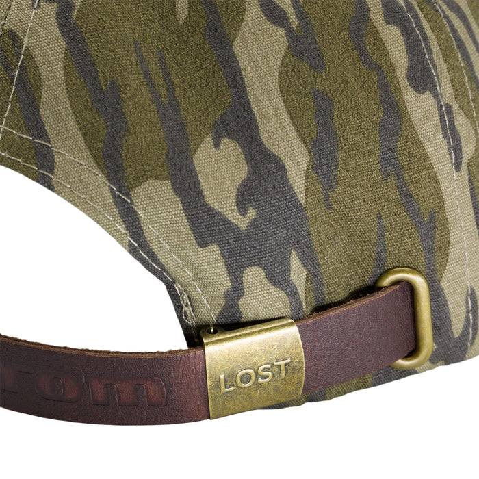 Ol' Tom camo cap featuring an embossed leather strap with a brass buckle and Lost branding.