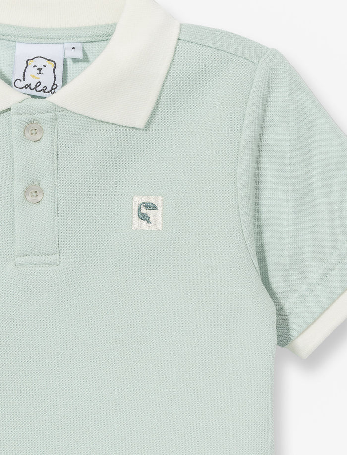 Polo à col contrastant