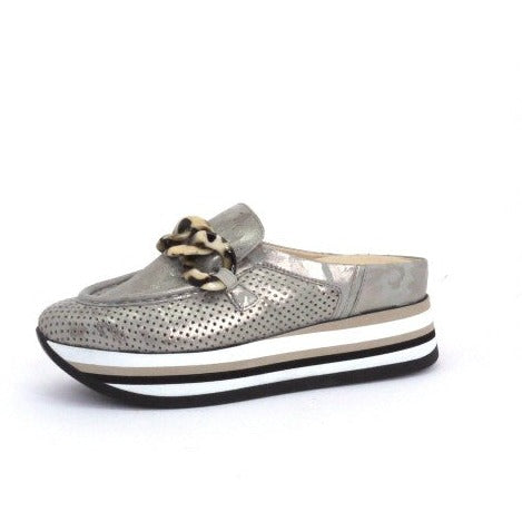 Metallic silver perforated suede slip-on sneaker with a leopard print chain detail and a striped platform wedge sole.