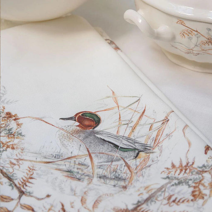 Sologne rectangular cotton tablecloth featuring a detailed duck and nature-inspired print in soft, natural tones.