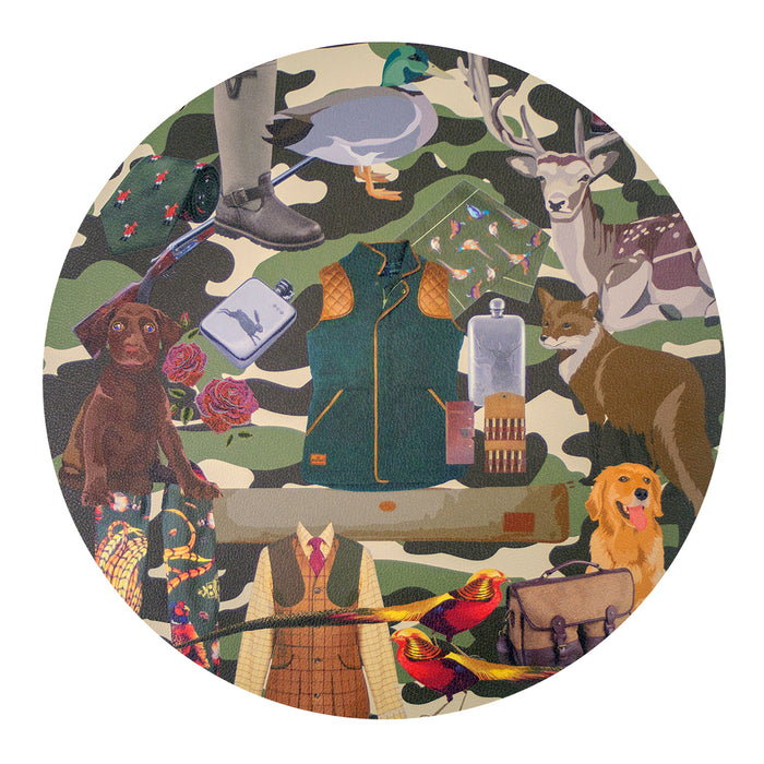 Round 16-inch Upland Hunt placemat featuring a sporting-themed collage on a caviar-textured vinyl with a green camo background.