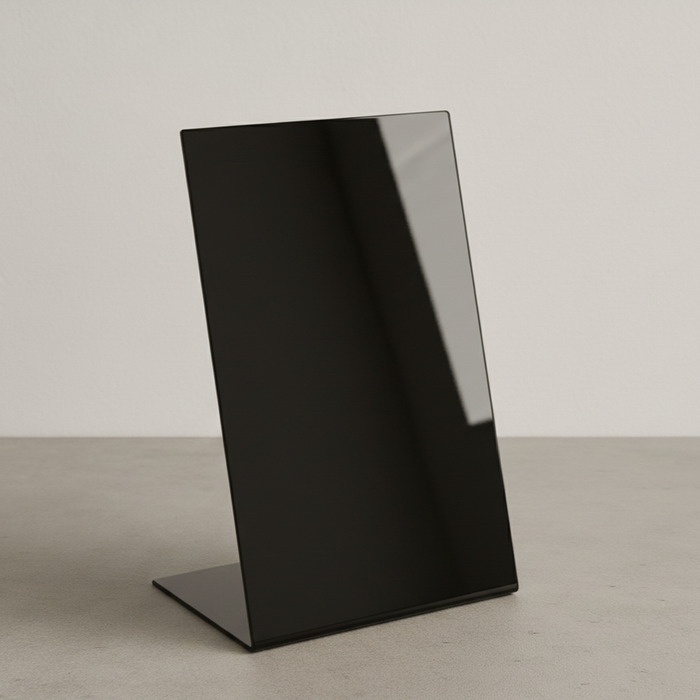 Black opaque acrylic tabletop stand in portrait orientation.