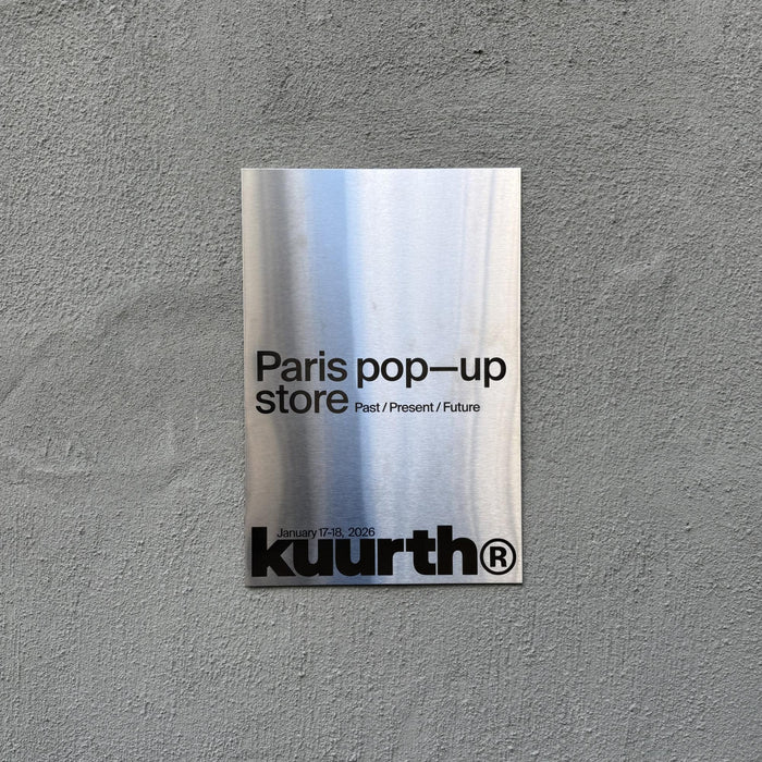 Small stainless steel plaque with Kuurth Paris Pop-up Store lettering.
