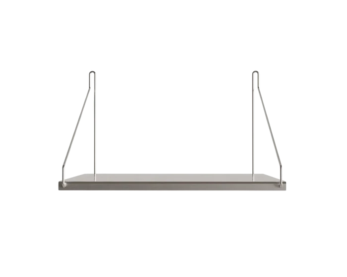 Deep compact stainless steel wall shelf with triangular wire brackets.