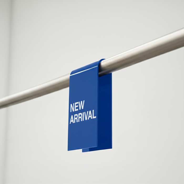 Blue opaque acrylic clothing rack clip with white New Arrival lettering.