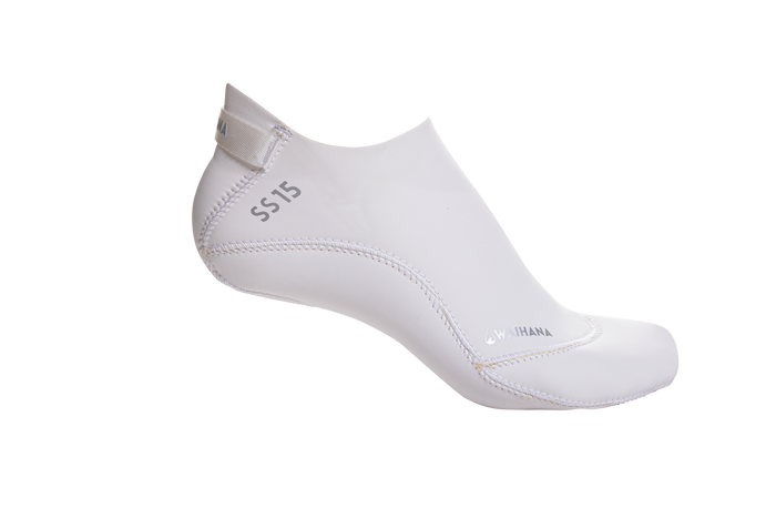 White Waihana SS15 neoprene dive sock with stitched sole and pull tab, displayed in profile against a black studio background.