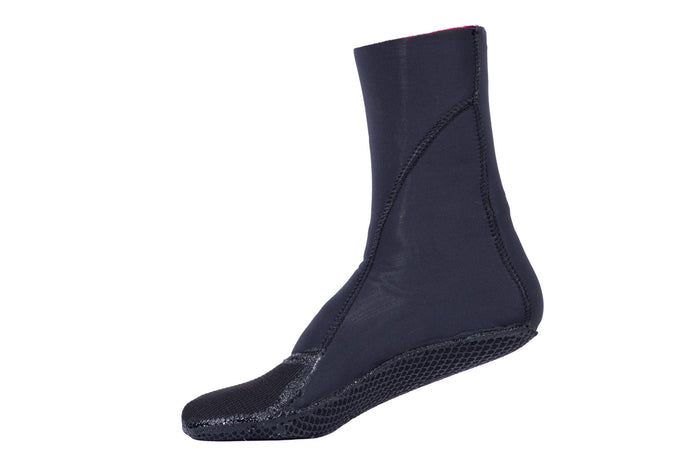 Waihana Essentials black neoprene high-top dive sock with grip sole and red cuff trim, shown in profile against a white background.
