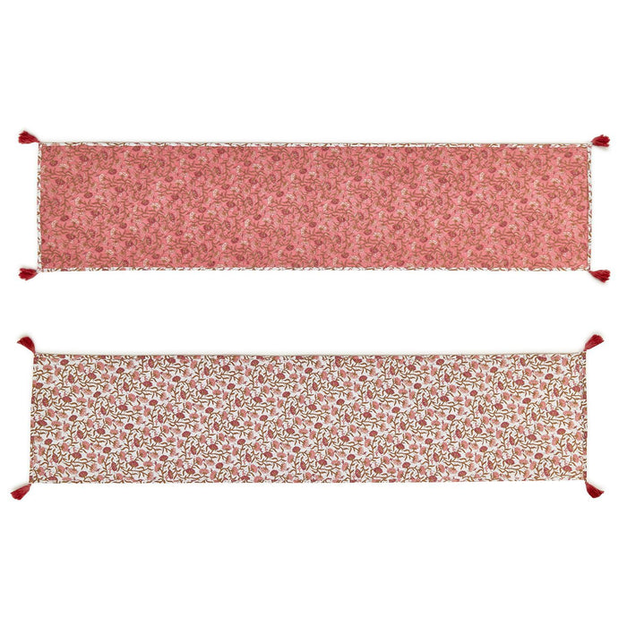 Reversible 16x72 quilted table runner in autumn blush floral print with decorative corner tassels.