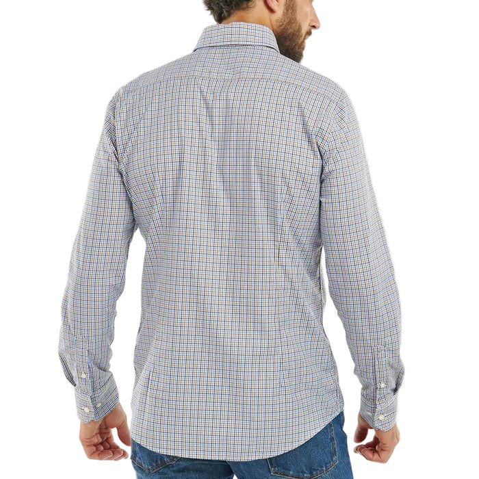 Back view of a man wearing a Barbour tailored long-sleeve performance shirt with a blue and tan tattersall check pattern.