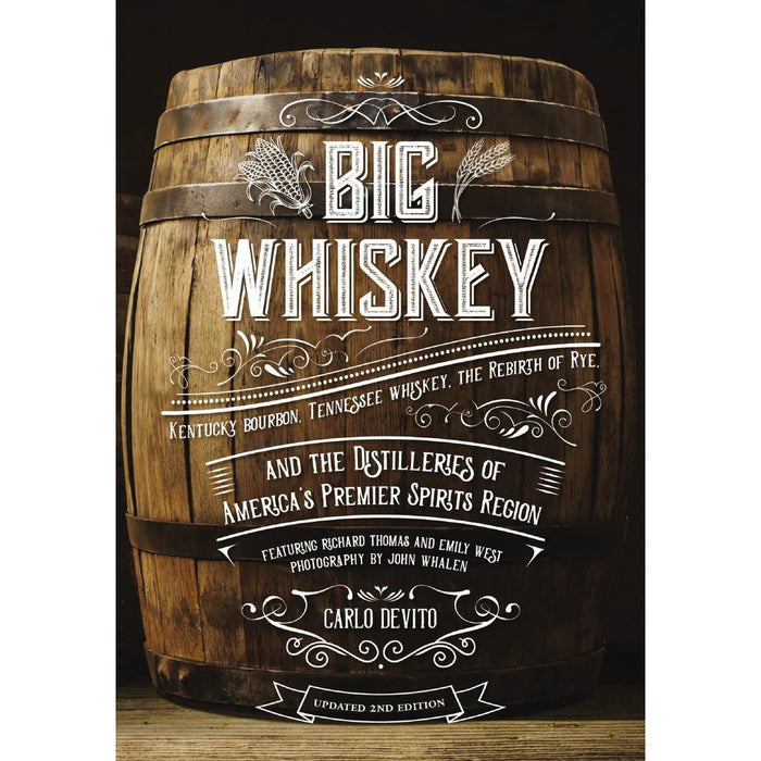 Big Whiskey Revised Edition book cover featuring white vintage typography over a rustic wooden whiskey barrel background.