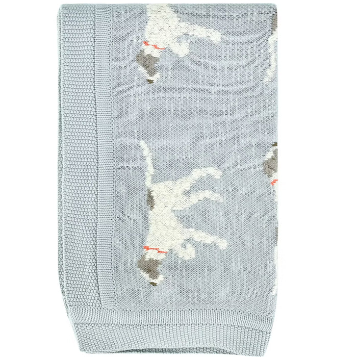Soft blue cotton knit blanket, 40" x 32", featuring a repeating pattern of white and brown dogs with red collars.
