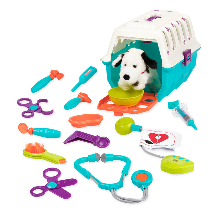 A toy vet kid for kids with a plush puppy in a carrier.