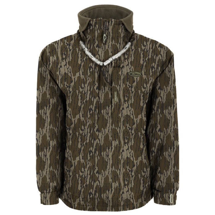 Drake MST fleece-lined 1/4 zip hunting pullover in camouflage pattern with high collar and duck call lanyard.