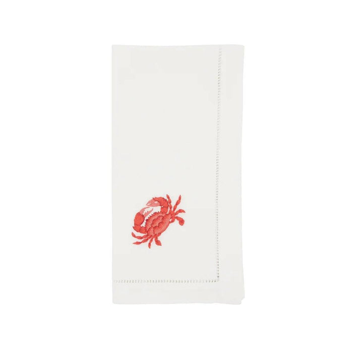 White 20-inch cotton napkin featuring a delicate red hand-embroidered crab design and elegant hemstitch border.