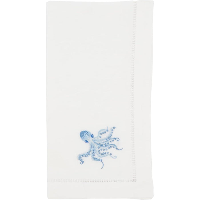 White 20-inch cotton napkin featuring a delicate blue hand-embroidered octopus and a classic hemstitch border.