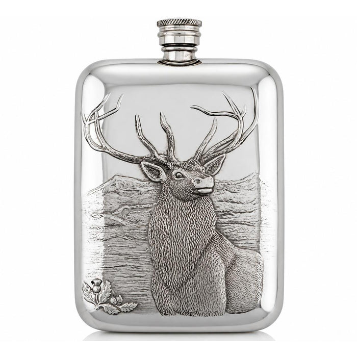 6 oz. polished English pewter flask featuring an embossed stag and mountain scene with a screw-top lid.