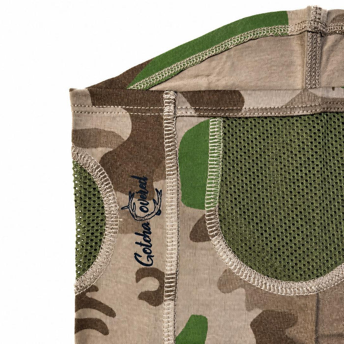 Camo bamboo neck gaiter with olive green mesh ventilation panels and Gotcha Covered logo embroidery.