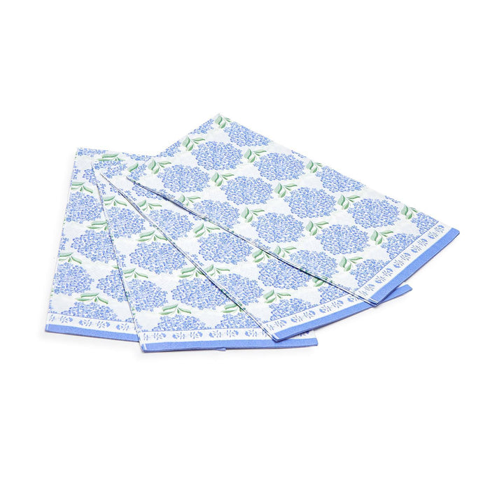 Three-ply paper guest towels featuring a blue hydrangea floral pattern with a decorative border on a white background.