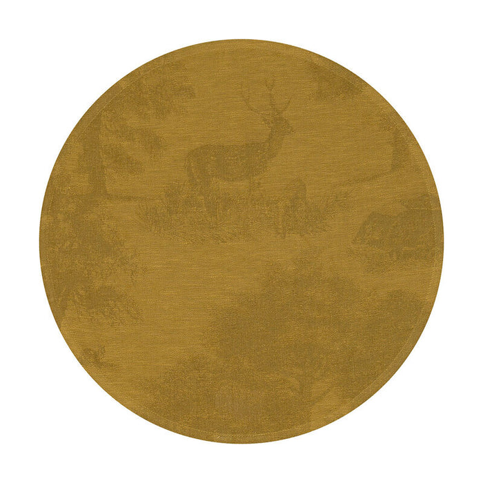 Round mustard-gold linen placemat featuring an intricate forest-themed toile de Jouy wildlife design.
