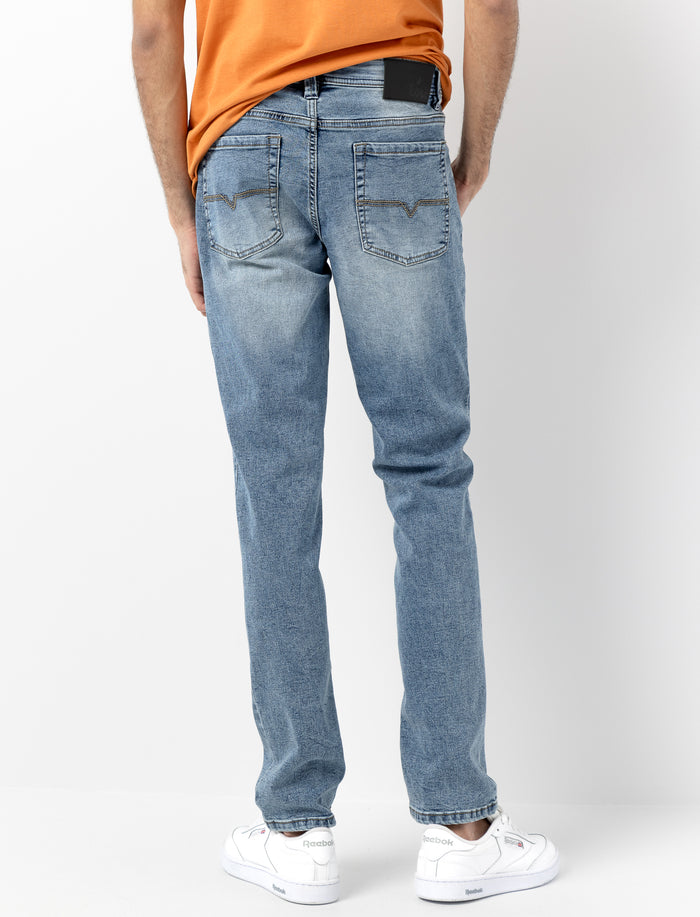 Jeans jambe étroite délavé