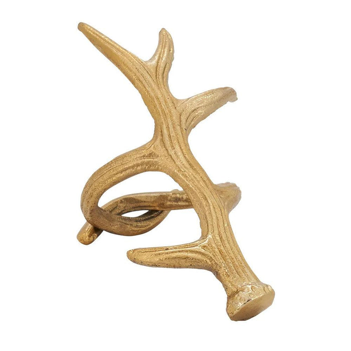 Gold-toned antler napkin ring with a textured, rustic finish for lodge-style dining table decor.