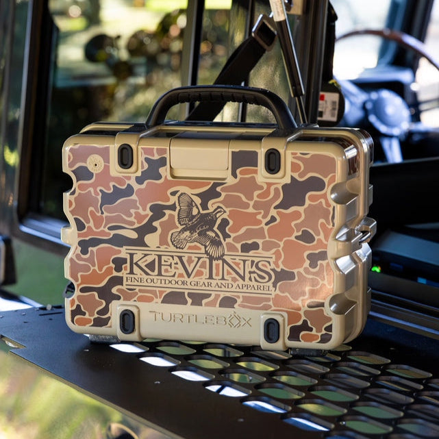 Turtlebox Gen 3 speaker featuring a vintage camo skin with Kevin’s Fine Outdoor Gear logo in a tan and brown color scheme.
