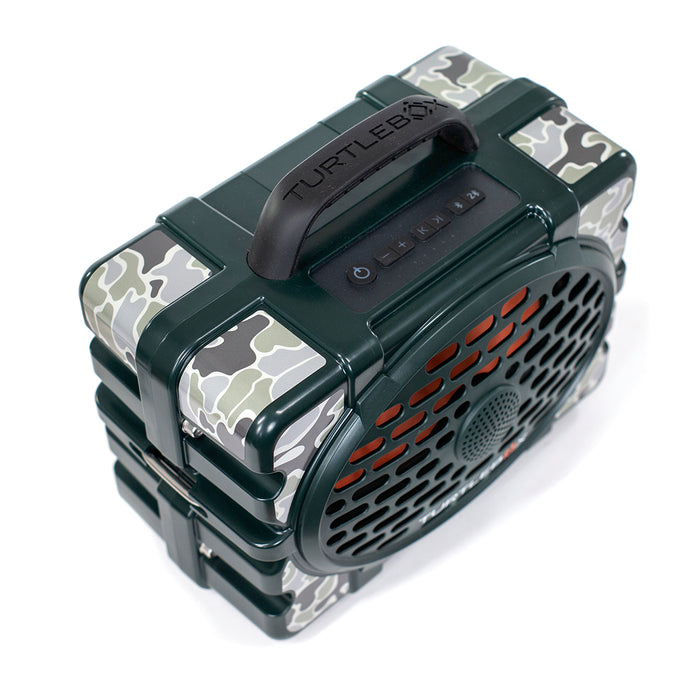 Turtlebox Gen 3 speaker featuring a vintage camo skin with green, grey, and white patterns on a dark green rugged frame.