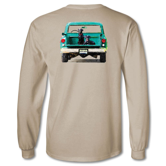 Tan Comfort Colors long sleeve tee featuring a vintage green truck with two black dogs in the bed on the back.