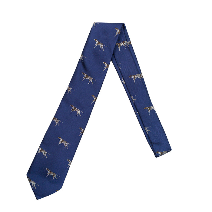 Handmade blue silk tie featuring a repeating pattern of brown and white hunting dogs, crafted in London.