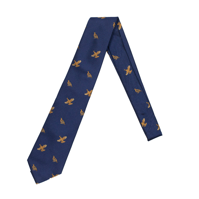 Handmade navy blue English silk tie featuring a gold pheasant pattern, crafted in London with archival country style.