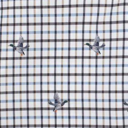 Lightweight performance shirt fabric featuring a white, blue, and brown tattersall plaid pattern with flying duck prints.