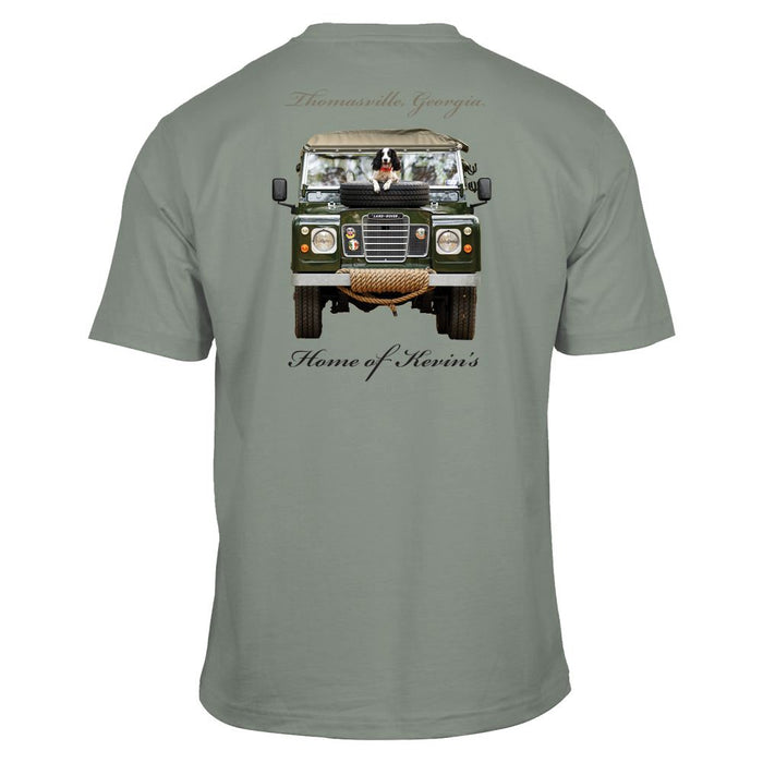 Sage green cotton t-shirt featuring a Land Rover Defender graphic with a dog on the hood and Thomasville, Georgia text.