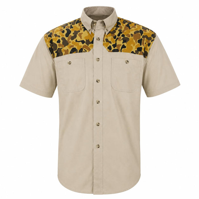 Tan short-sleeve shooting shirt with camo shoulder patches, button-down collar, and dual chest pockets.