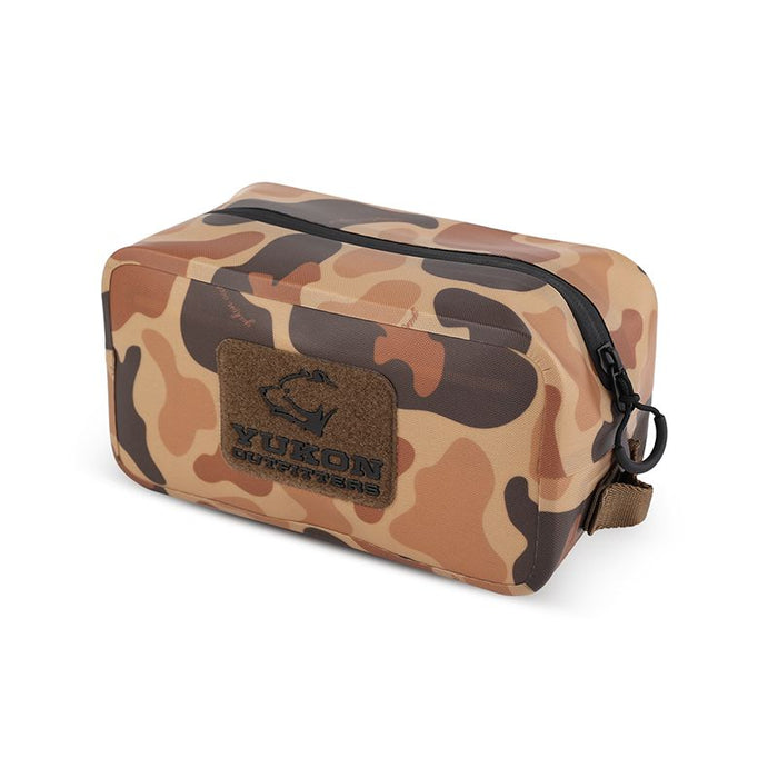 Camo TPU dry pack with a black water-resistant zipper, Yukon Outfitters patch, and durable rectangular design.