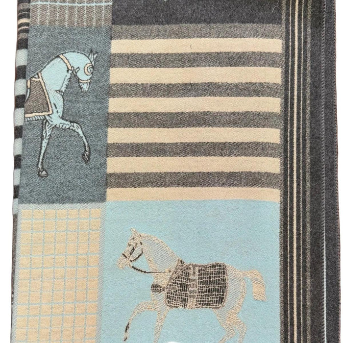 Soft acrylic wrap featuring a blue and grey equestrian horse motif, striped patterns, and a cozy cashmere-like texture.