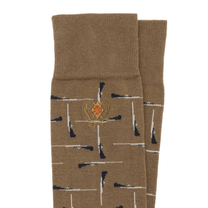 Brown Peruvian Pima cotton boot socks featuring a shotgun and antler pattern with an embroidered logo.