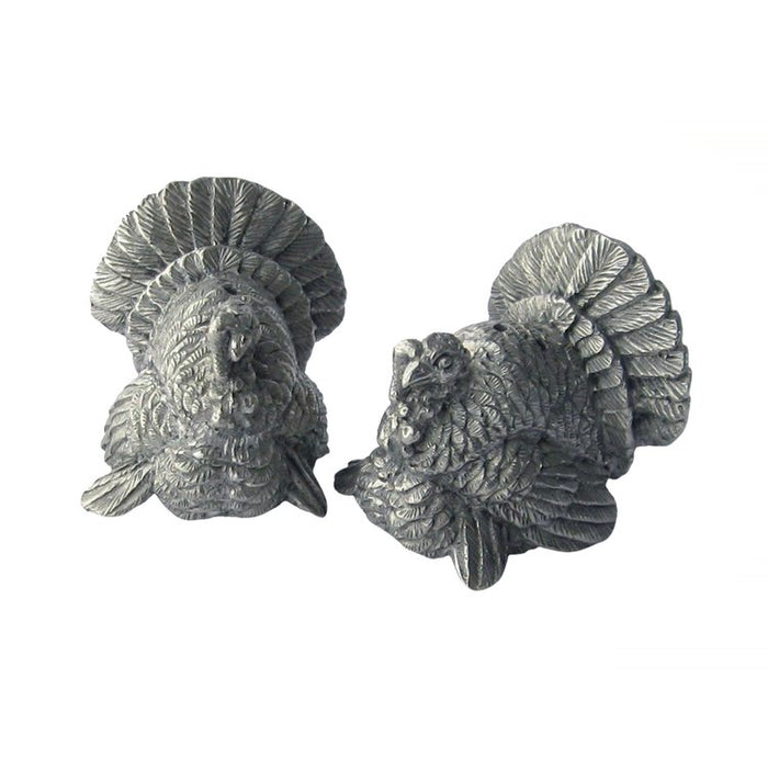 Handcrafted fine pewter salt and pepper shakers shaped like detailed turkeys with a metallic silver finish.