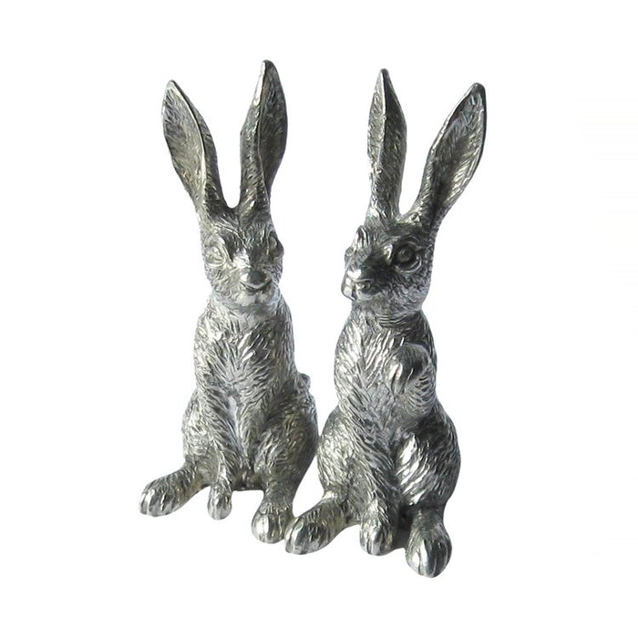Handcrafted fine pewter salt and pepper shakers shaped like two detailed, upright sitting rabbits.