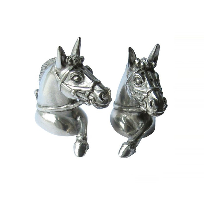 Handcrafted fine pewter salt and pepper shakers shaped like detailed horse heads with a polished silver finish.