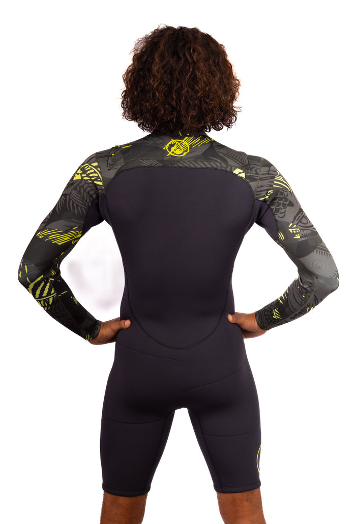 Rear view of a male model wearing the Waihana Men's Lime Fishbone Long Sleeve Spring Suit, showing the black neoprene back panel and bold yellow-green fishbone-patterned long sleeves and shoulders against a white background.