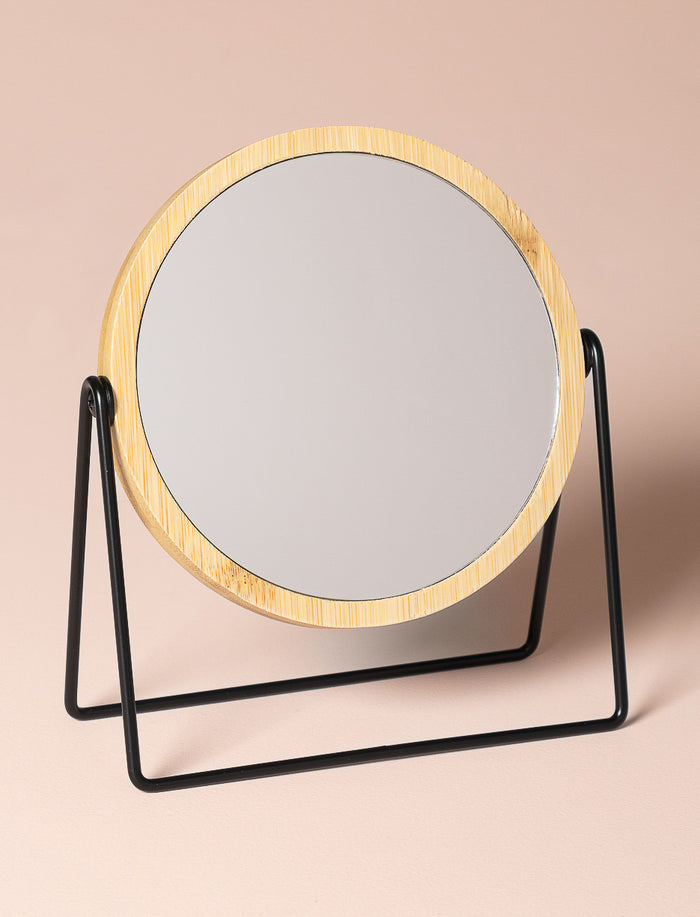 Miroir rond sur pied en métal