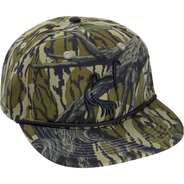 Ol' Tom camo mid-crown cap with black paracord detail and embroidered logo on a durable poly-cotton blend fabric.