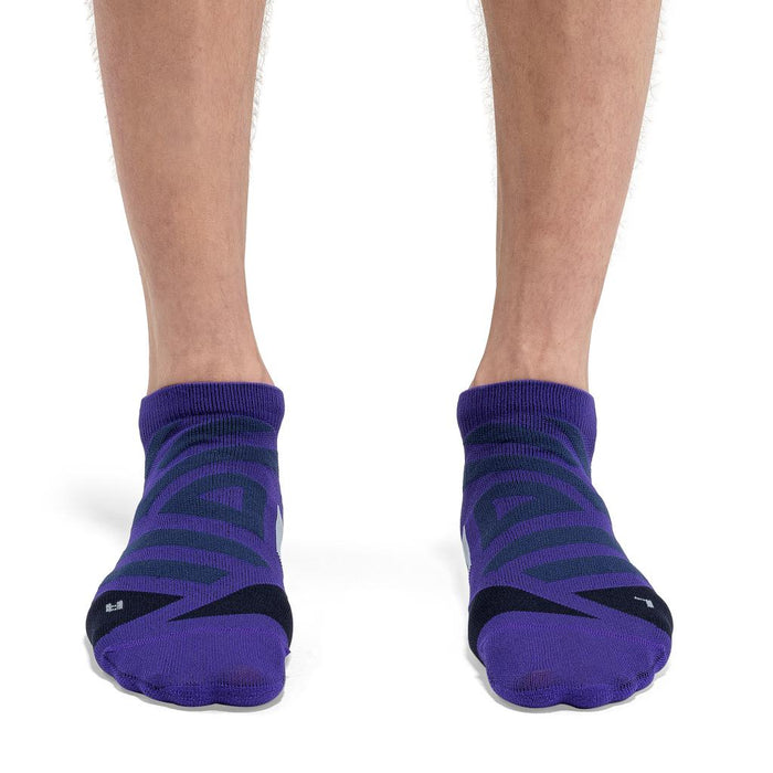 On Running men's low-cut performance socks in purple with technical mesh paneling and targeted arch support.