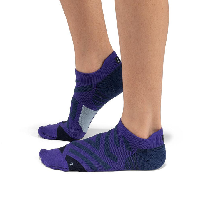 On Running women's low-cut performance running socks in purple with technical mesh panels and targeted arch support.