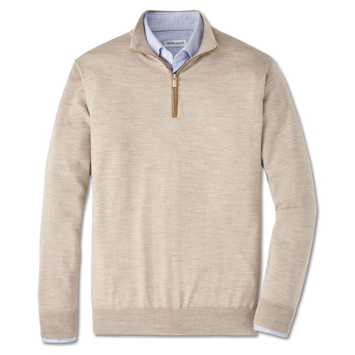 Beige Merino wool quarter-zip sweater with suede zipper trim layered over a blue gingham shirt.