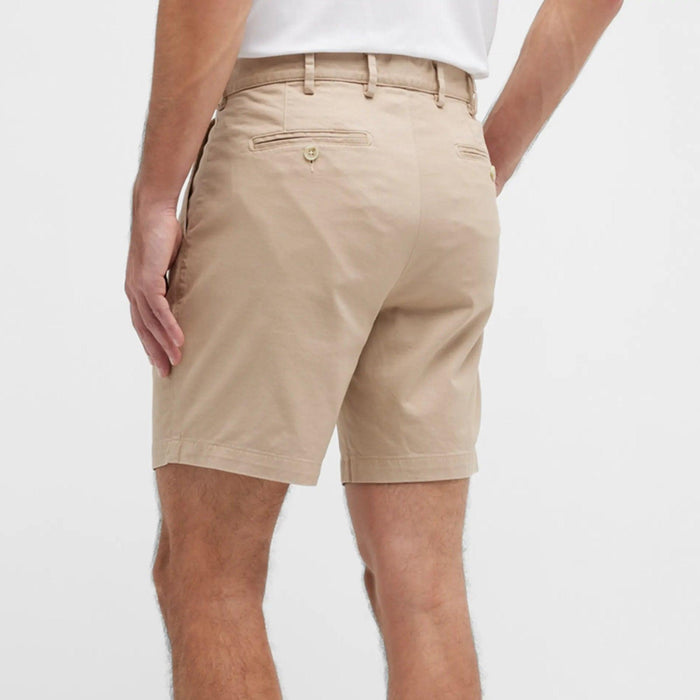 Men wearing tan Peter Millar Pilot Twill shorts in a classic fit with back pockets and a soft cotton stretch fabric.